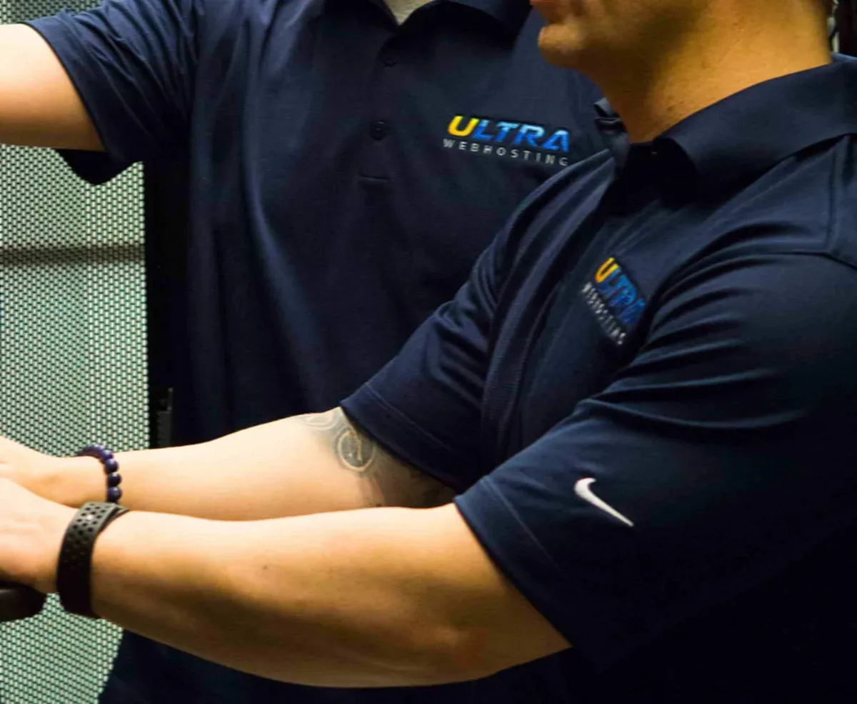 Ultra Web Hosting staff working hands-on with servers in the datacenter